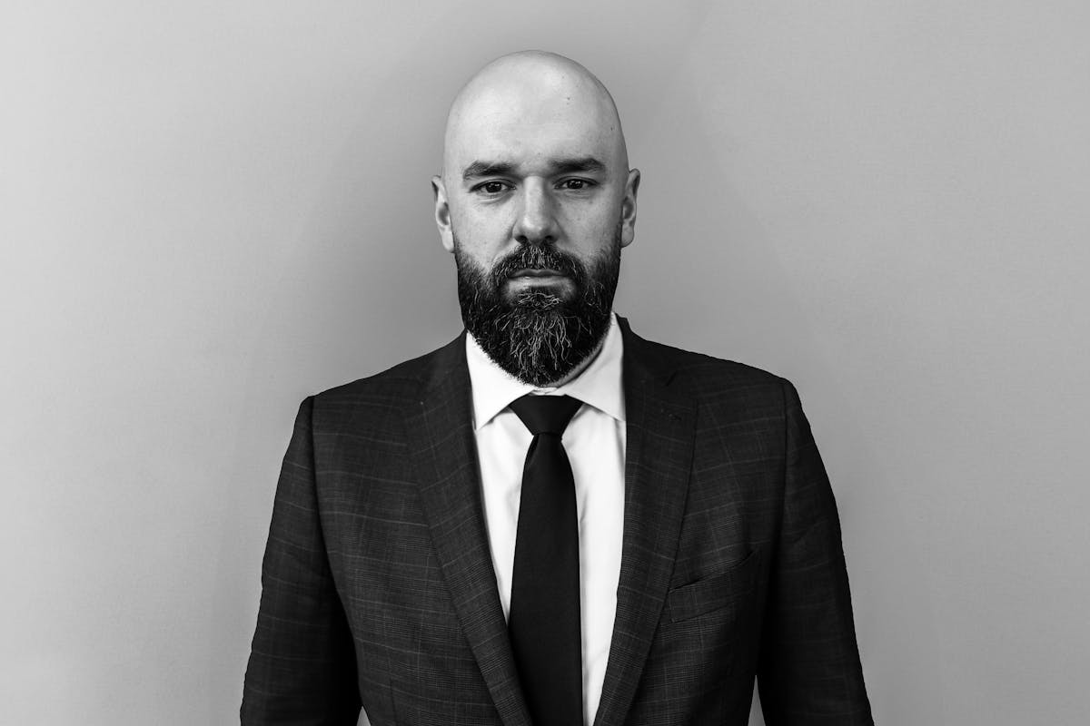 a man wearing a suit and tie