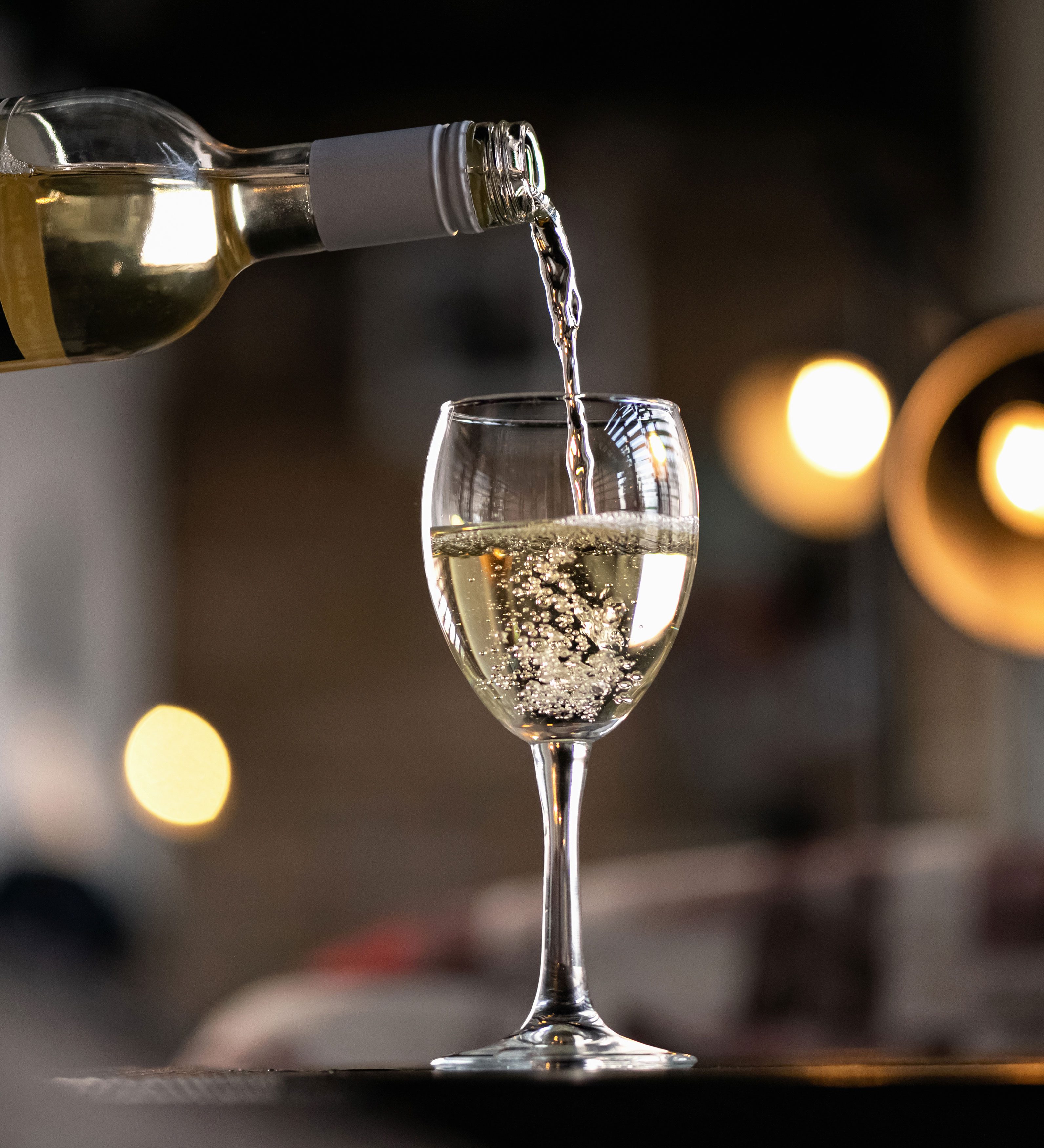 a glass of Chardonay wine