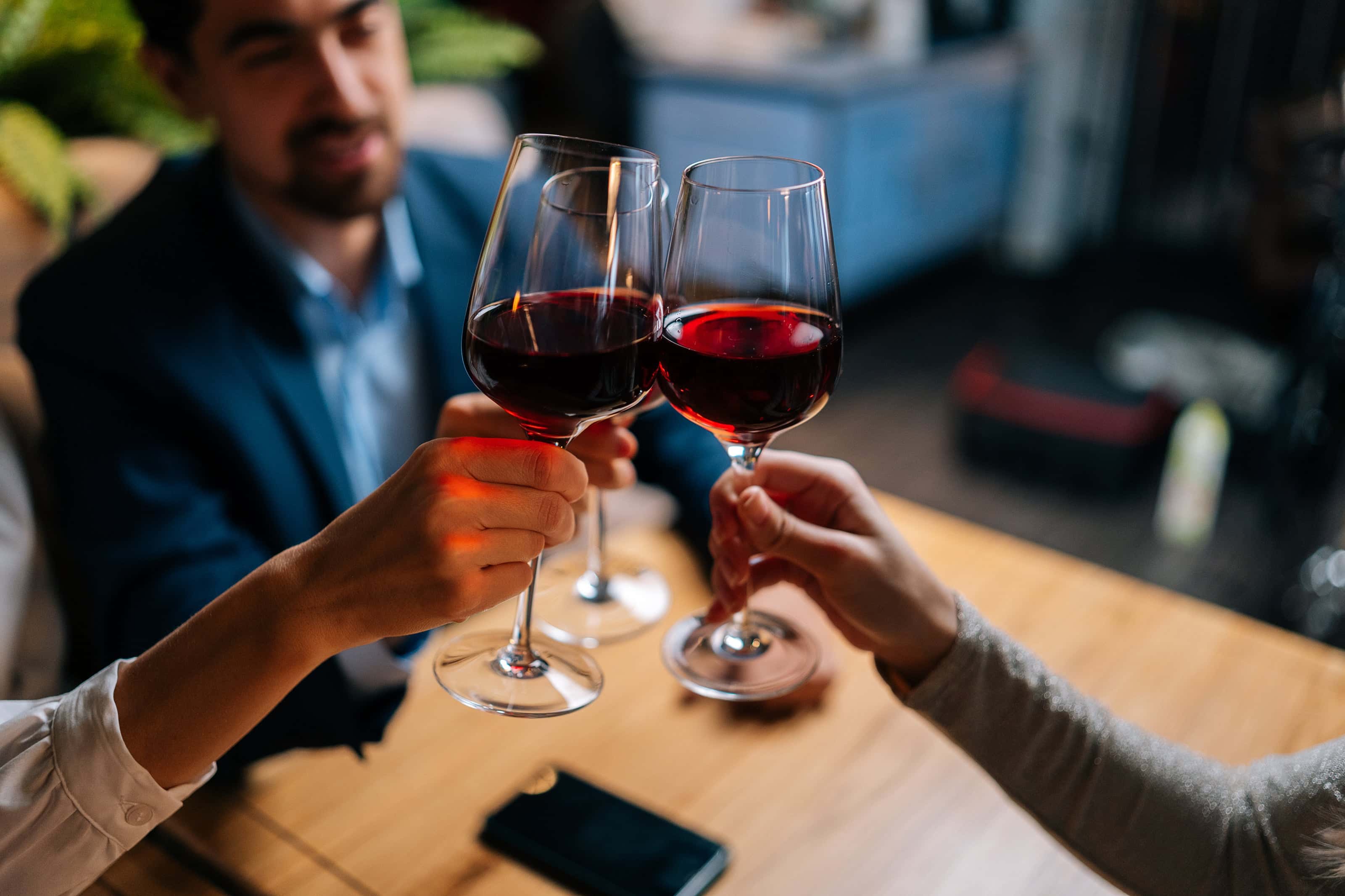 a group of people toasting