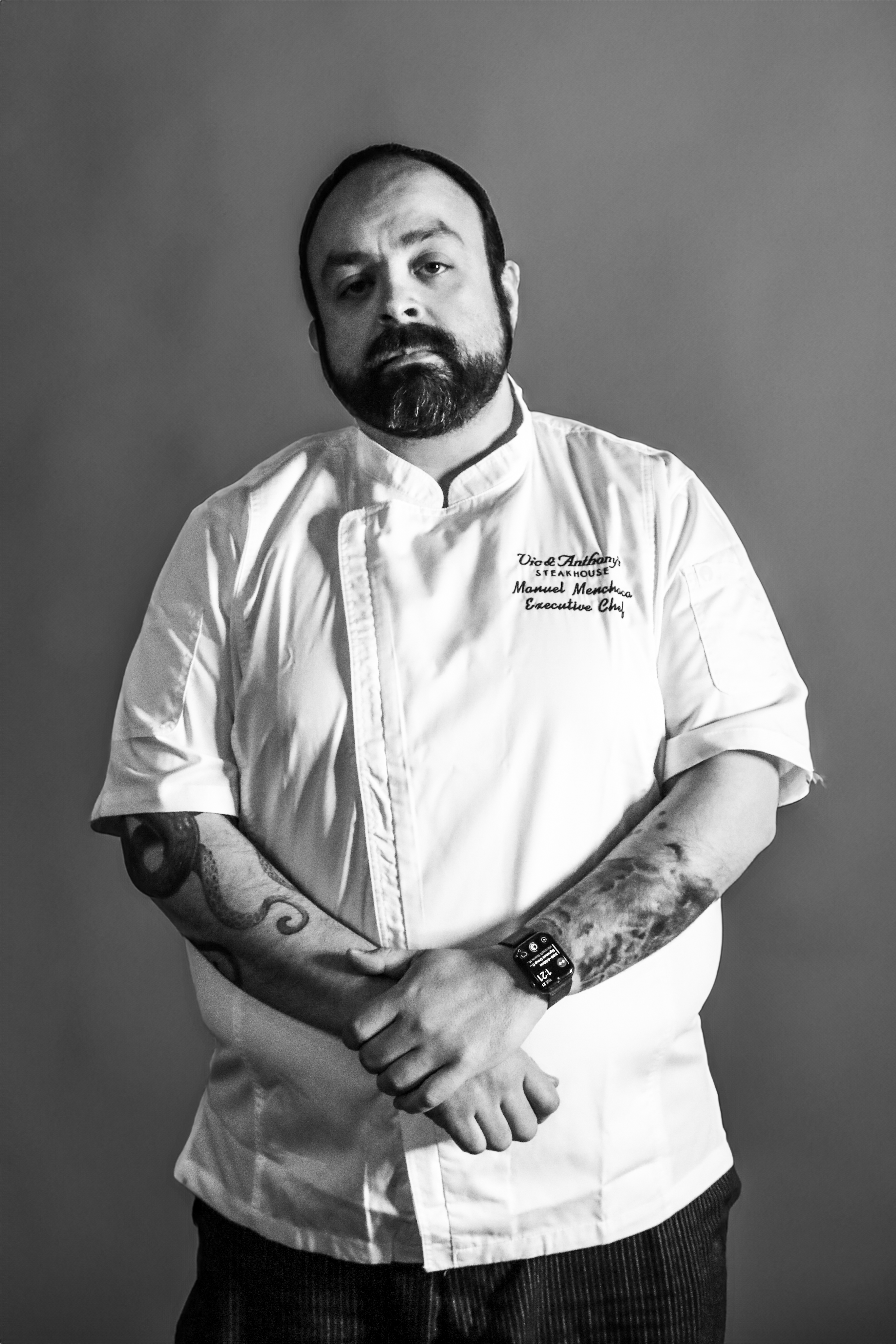 a person standing posing for the camera