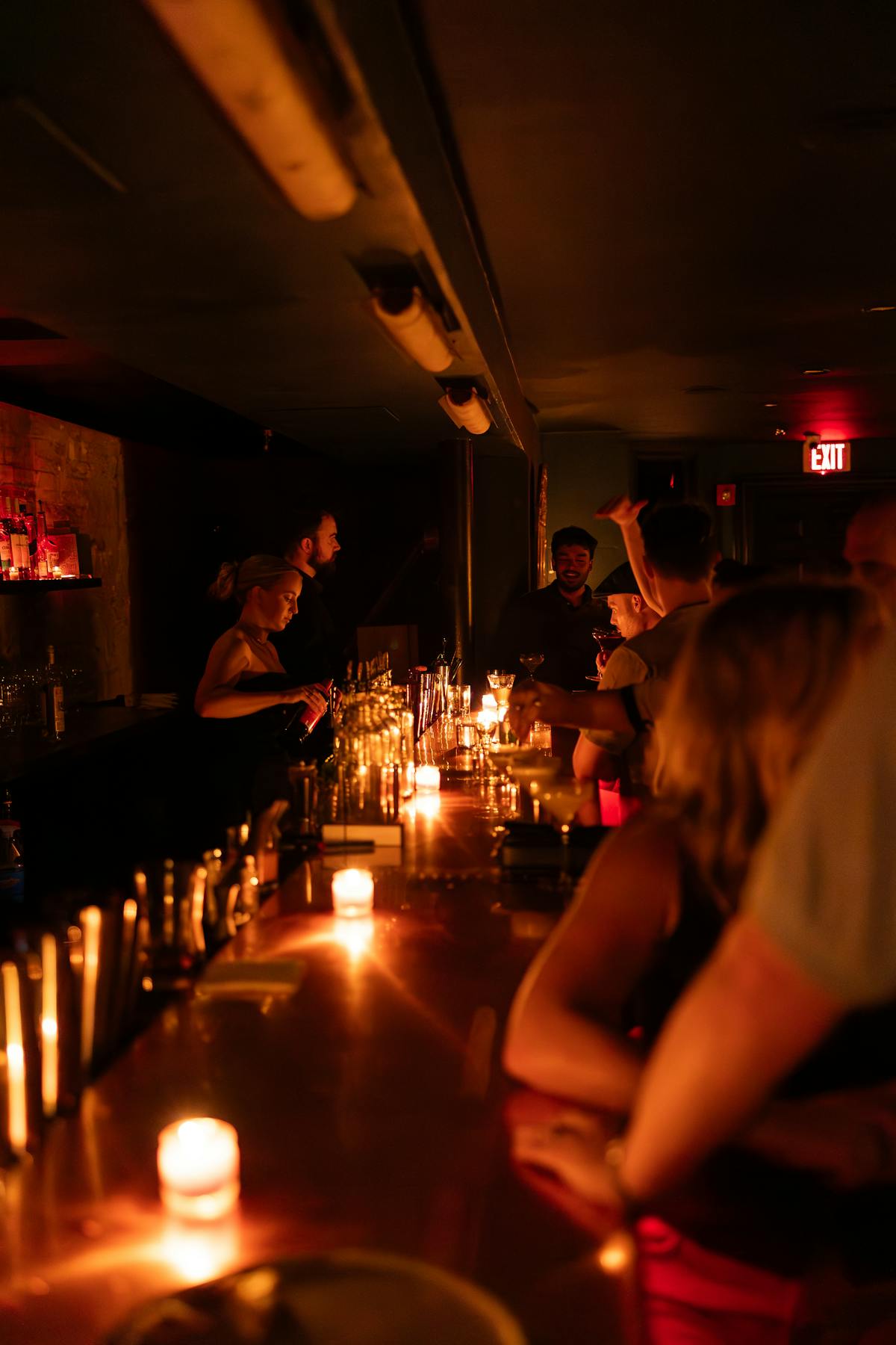 a group of people in a dark room
