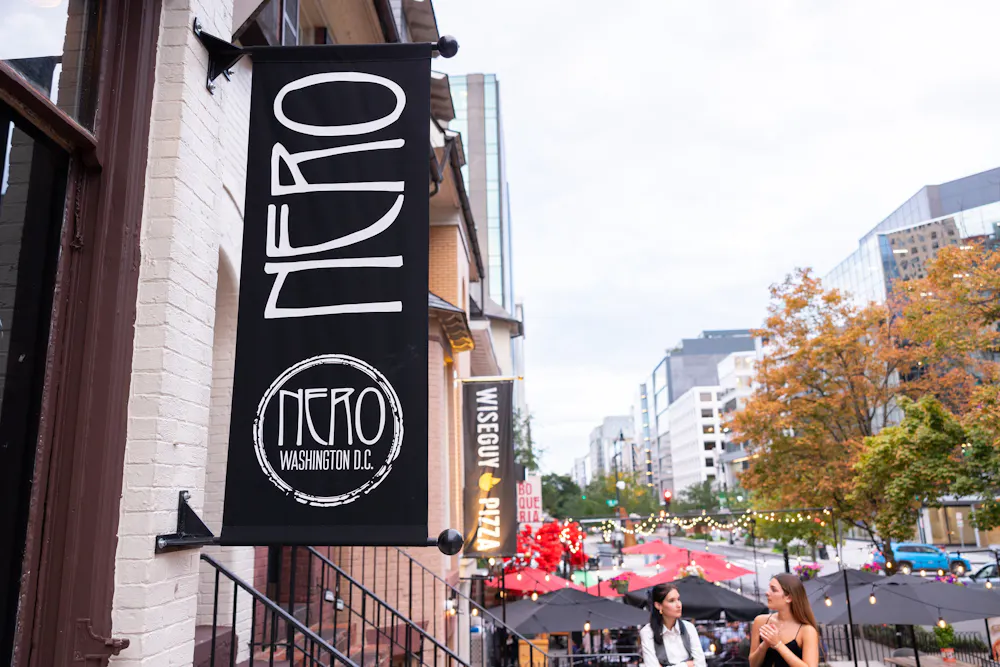 a door is open to a brick building