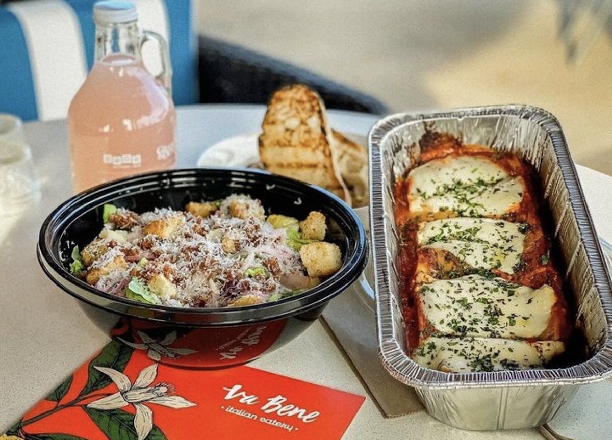 a bowl of food sitting on a table