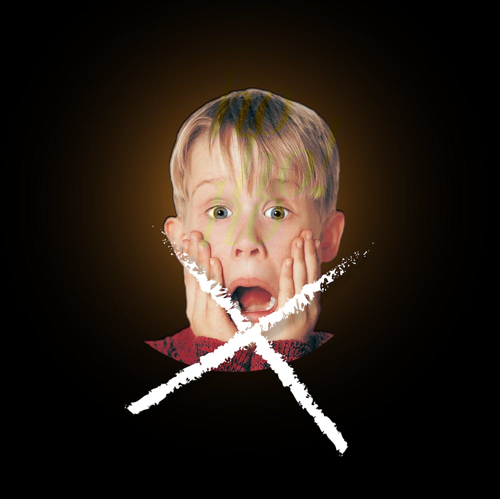 a little girl sitting in a dark room