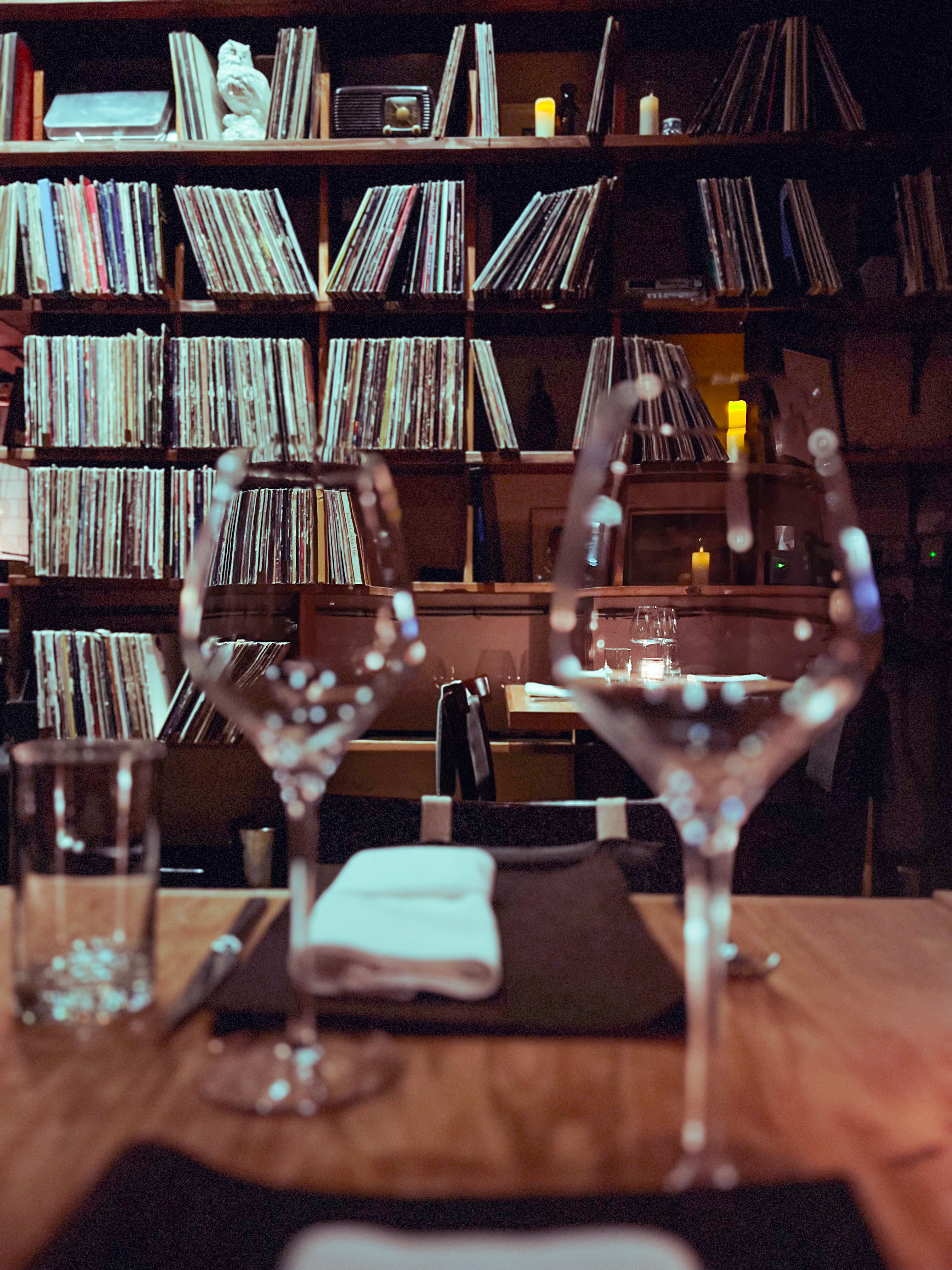 a glass of wine on a table