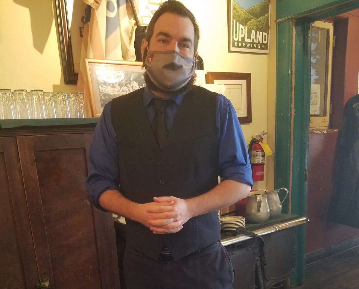 a person standing posing for the camera