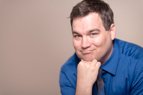 a man in a blue shirt