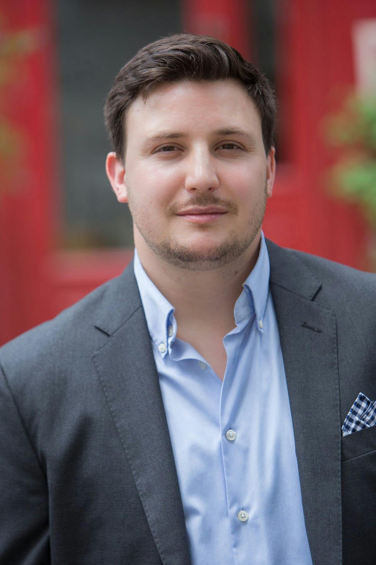 a man wearing a suit and tie