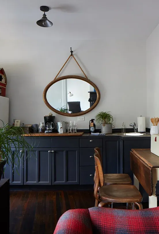 a living room filled with furniture and a fire place