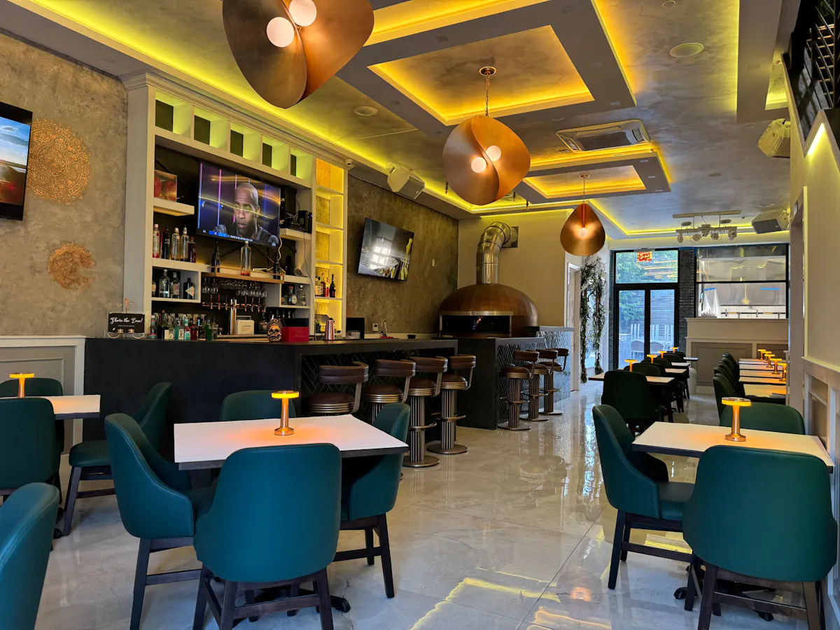 a room filled with furniture and a table in a restaurant