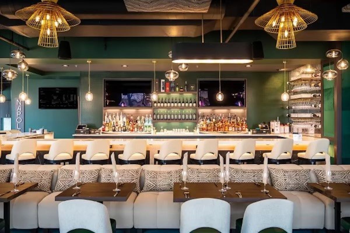 a room filled with furniture and a table in a restaurant