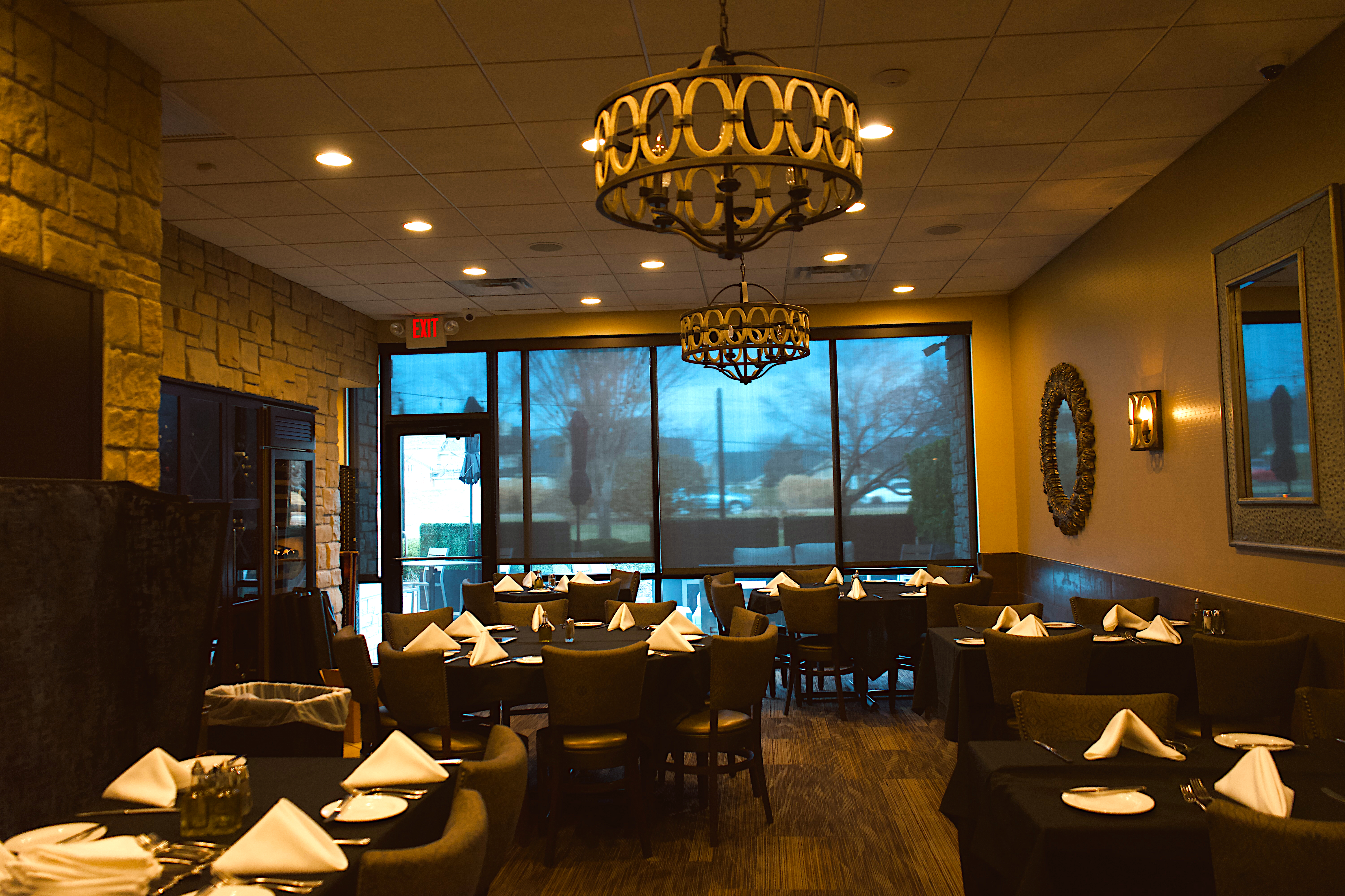 a room with tables and chairs