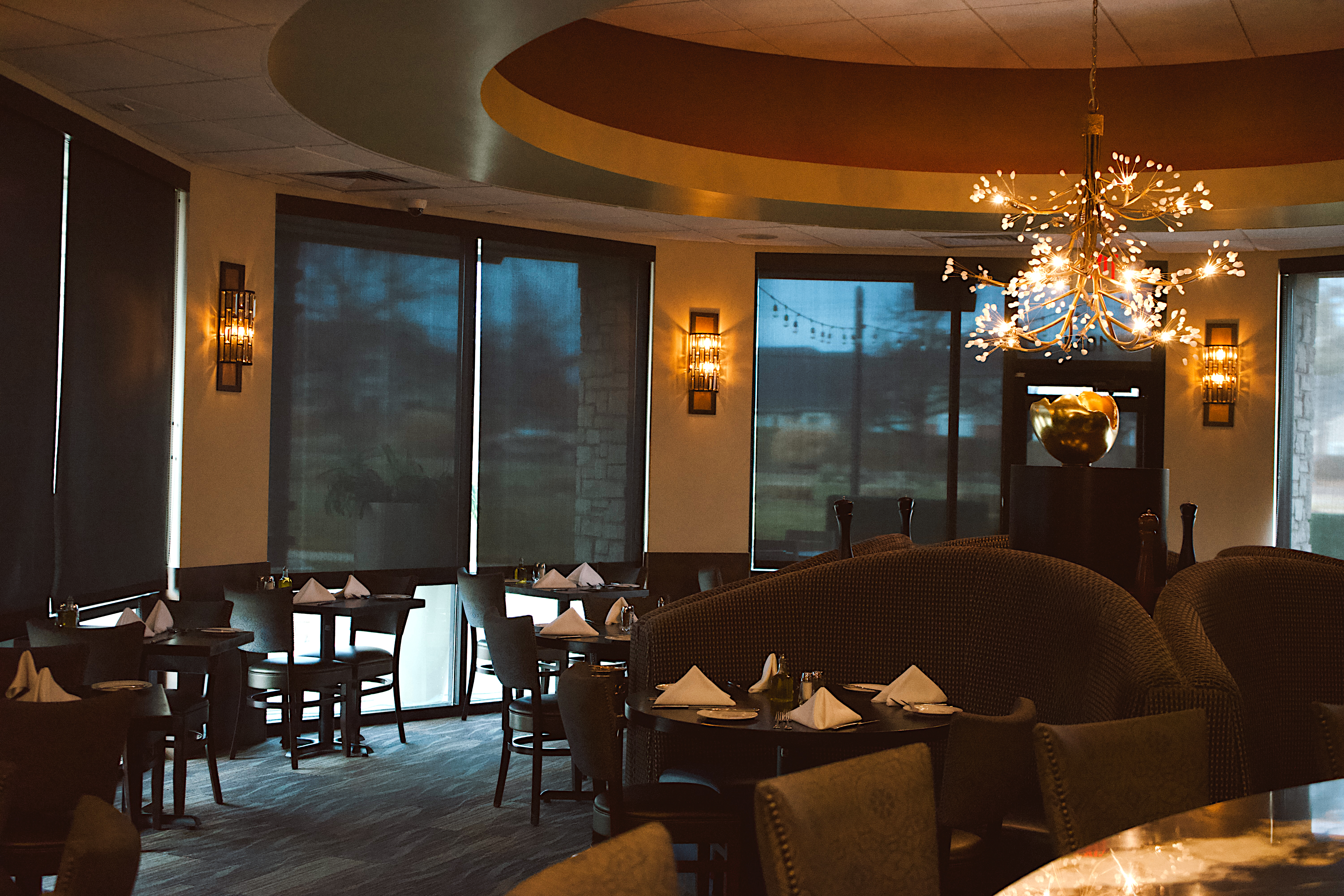 a room with tables and chairs