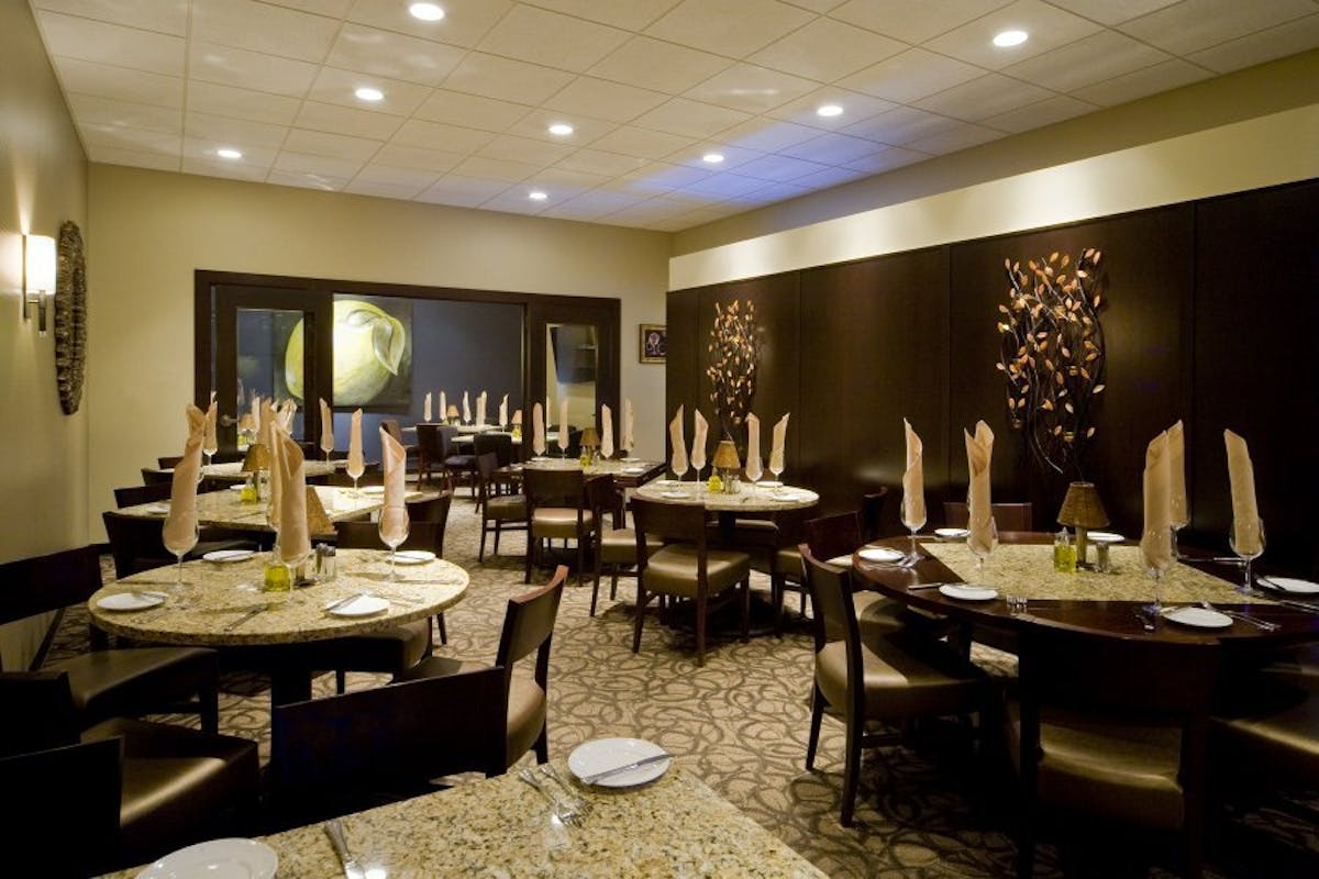 a room filled with furniture and a table