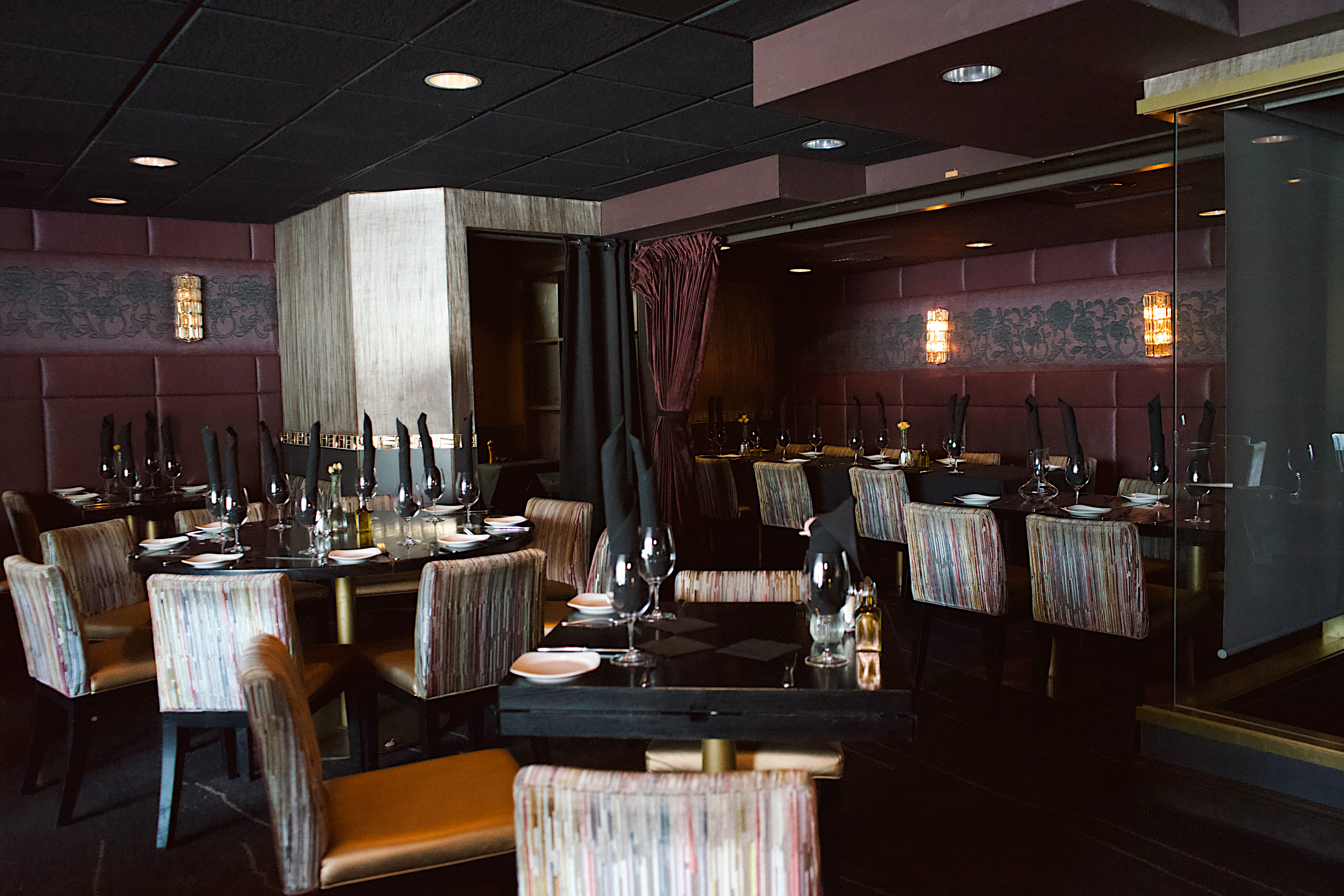 a restaurant with tables and chairs