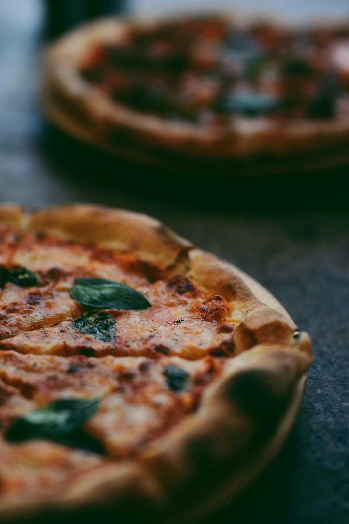 a close up of a slice of pizza