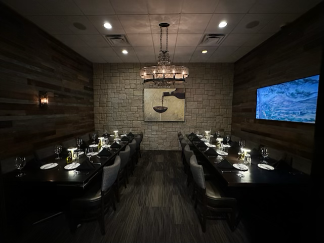 a kitchen with an island in the middle of a room