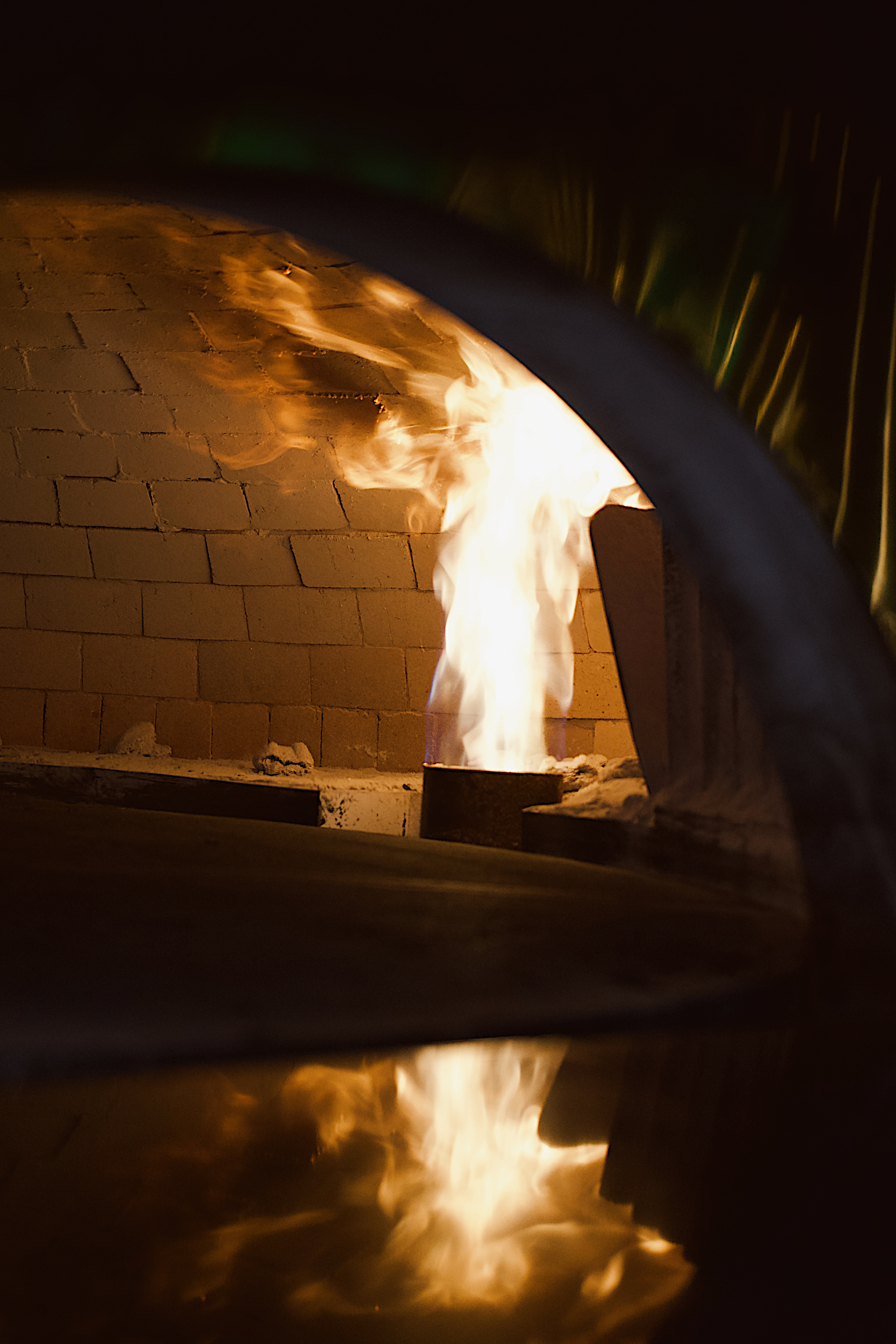 a fire in a brick oven