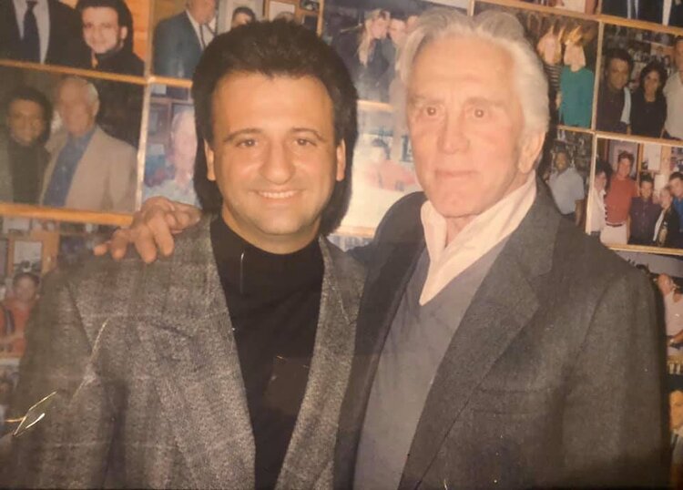 Eddie Moussa, Kirk Douglas posing for the camera