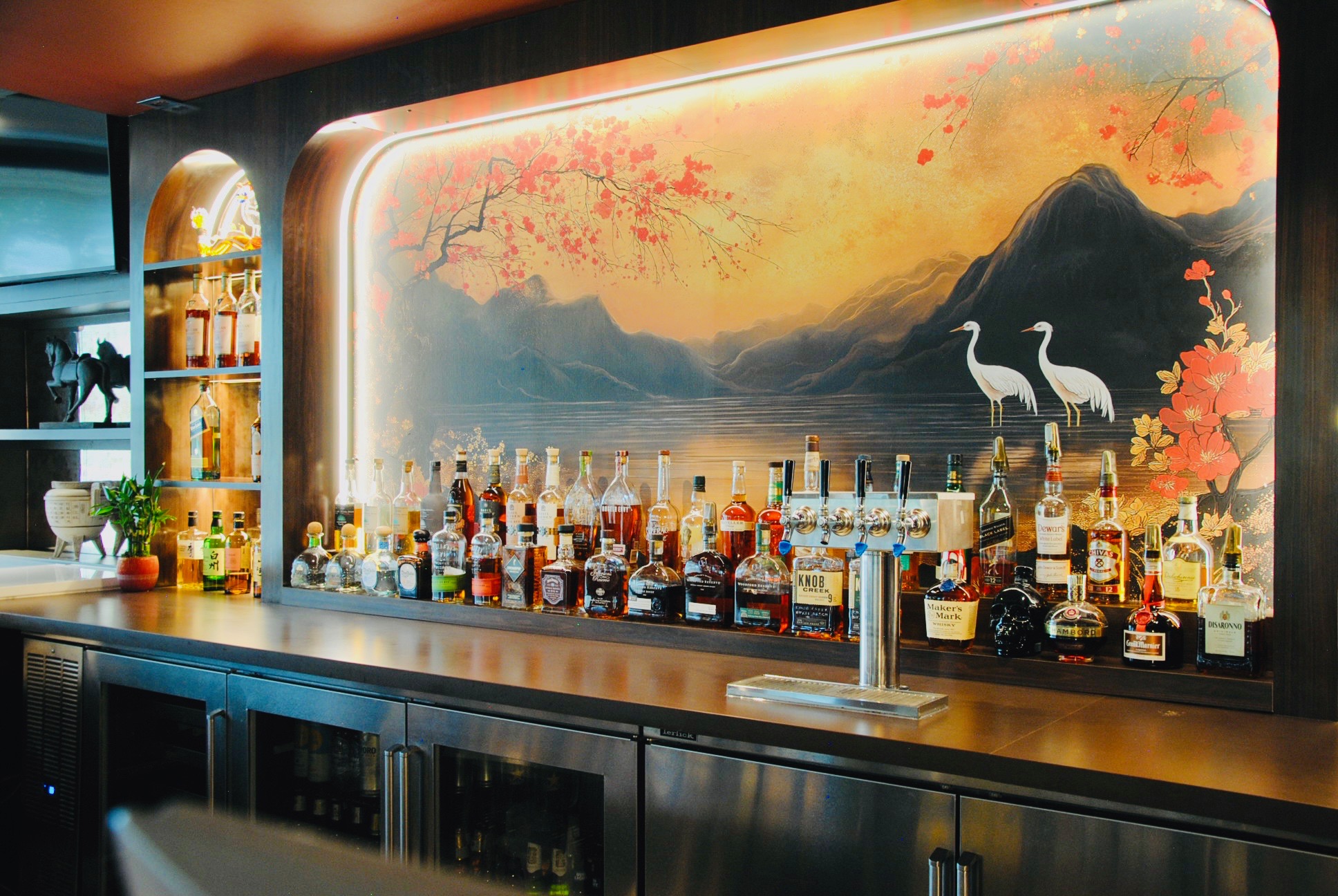 a bar with bottles of alcohol