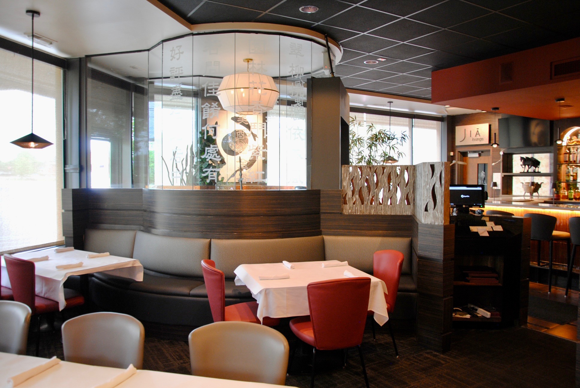 a restaurant with tables and chairs