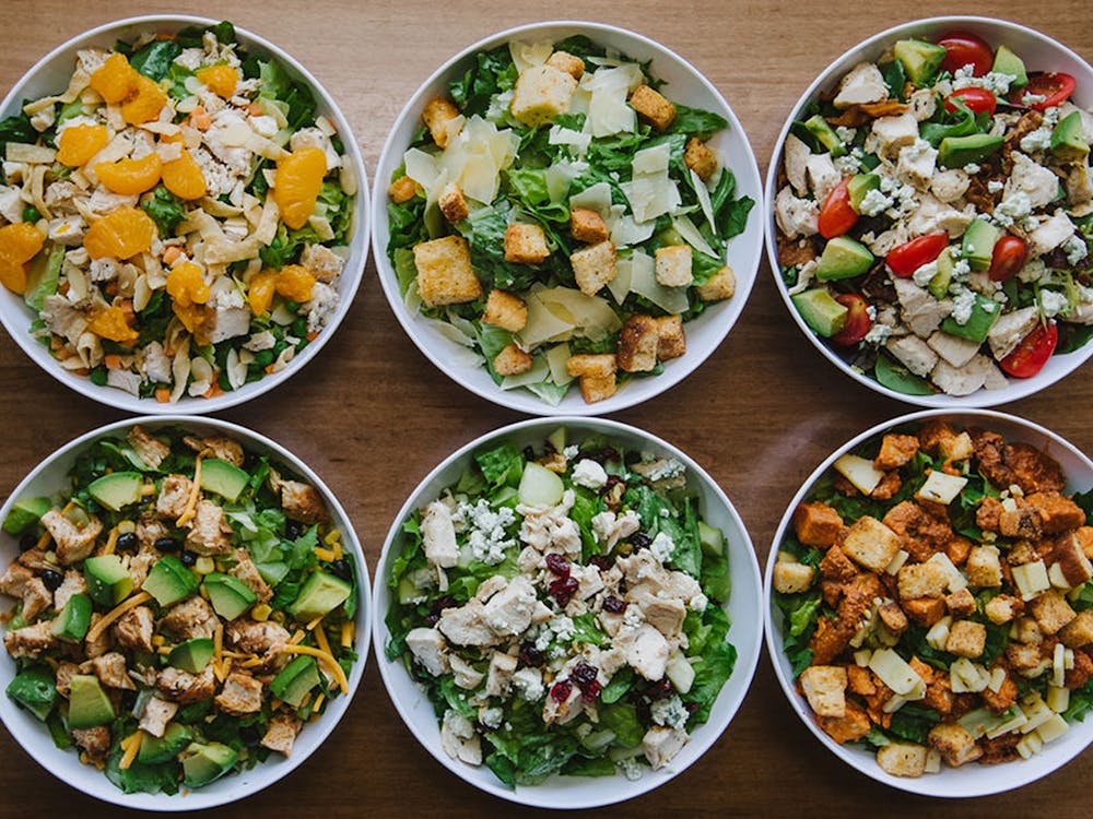 Salad house most popular salads arranged on table