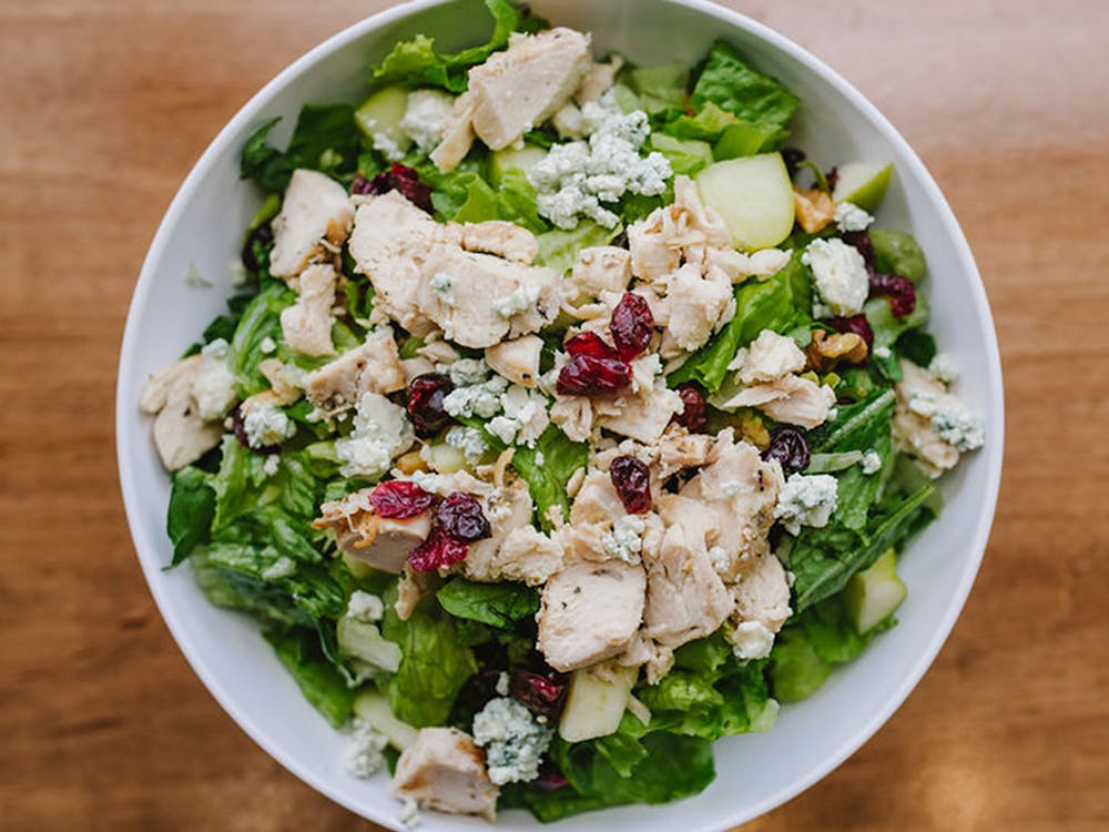a bowl of salad on a plate