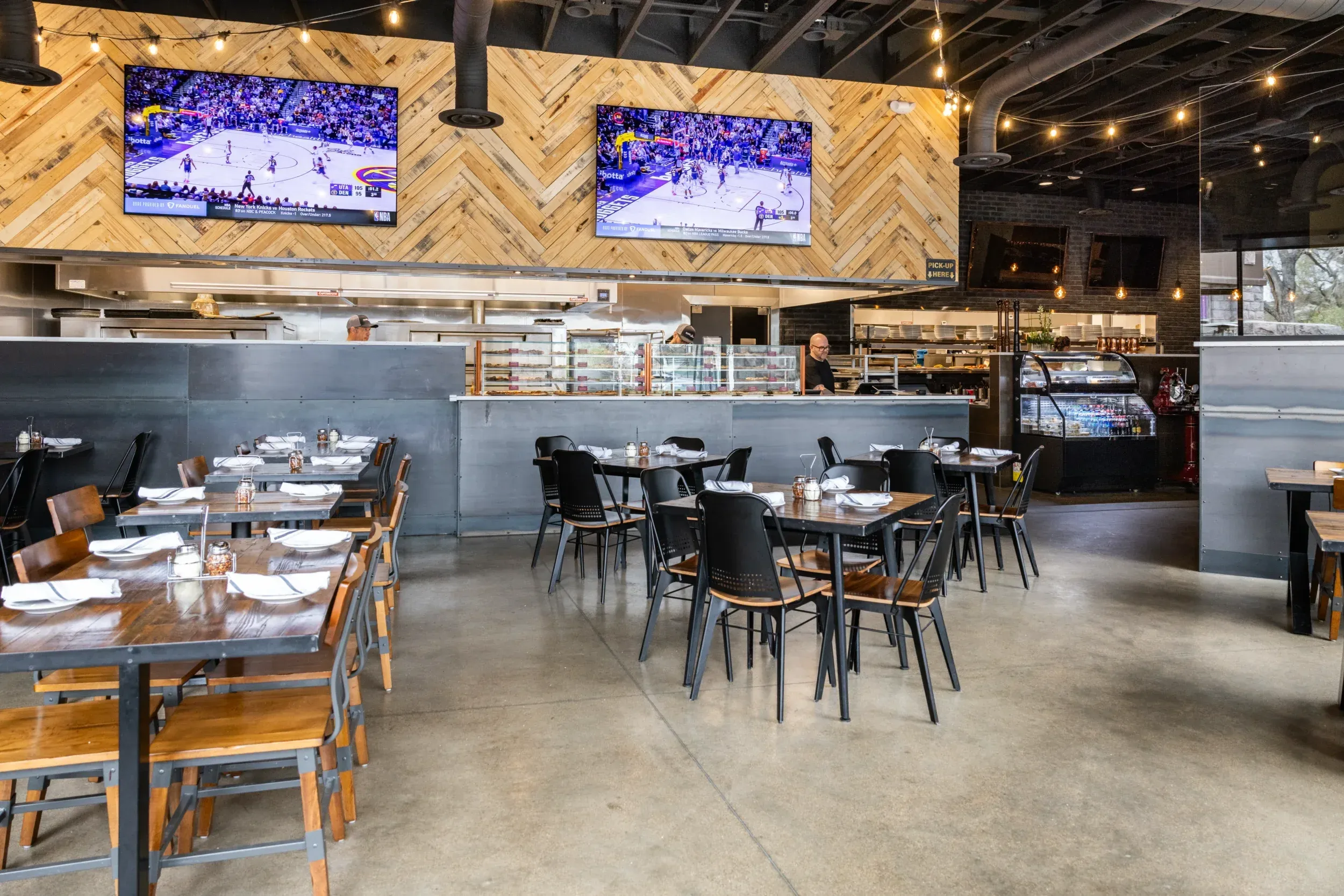 a restaurant with tables and chairs