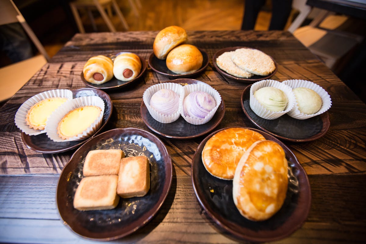 an array of plates topped with different types of food