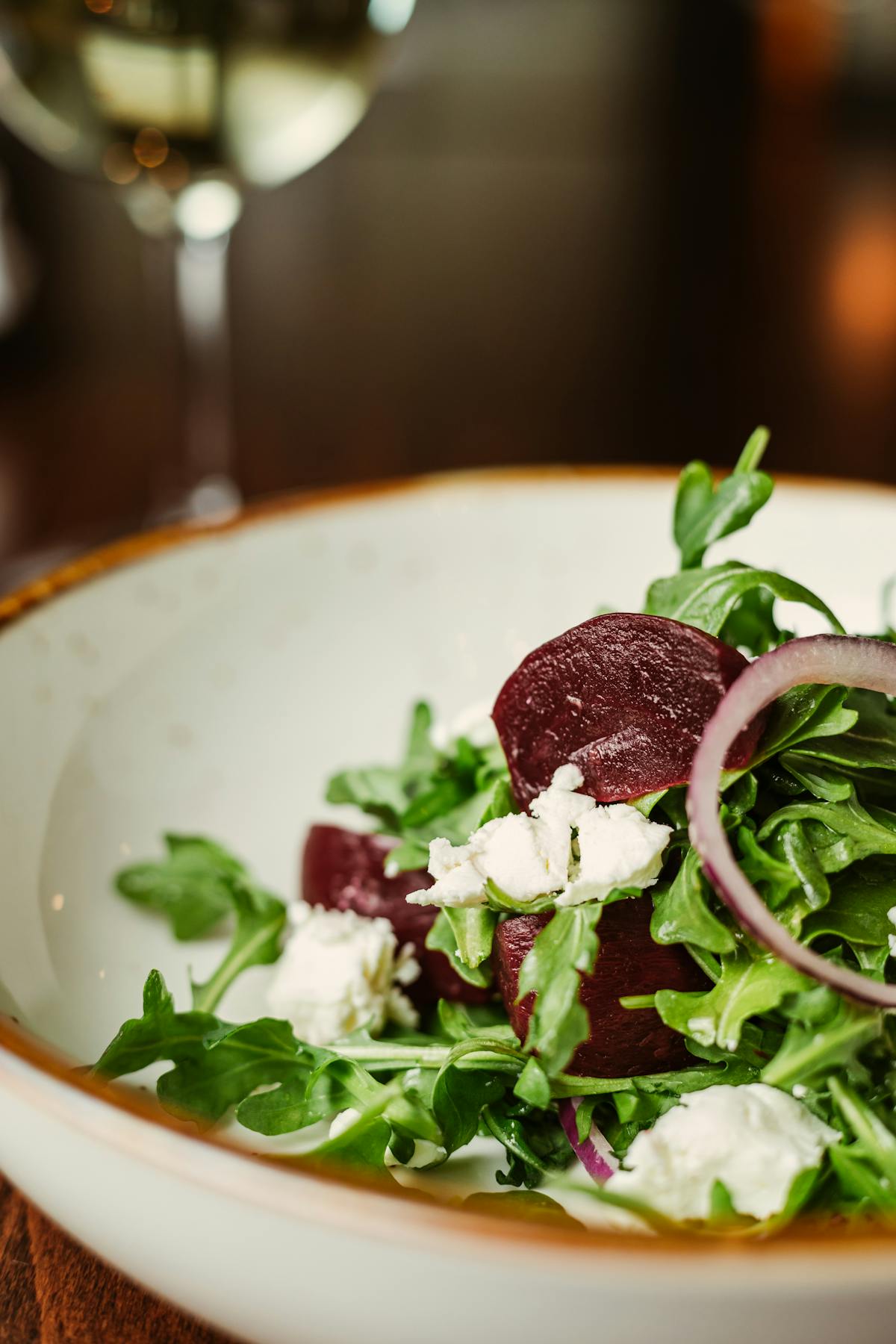 a bowl of salad on a plate