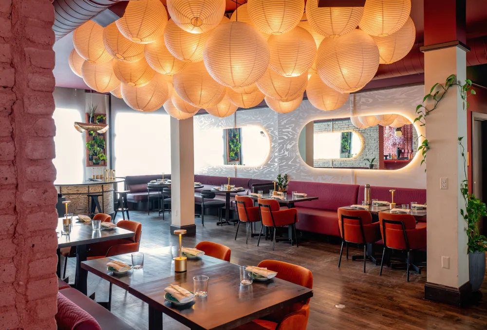 a restaurant with tables and chairs