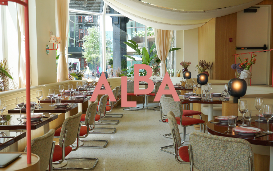 a living room filled with furniture and vase on a table