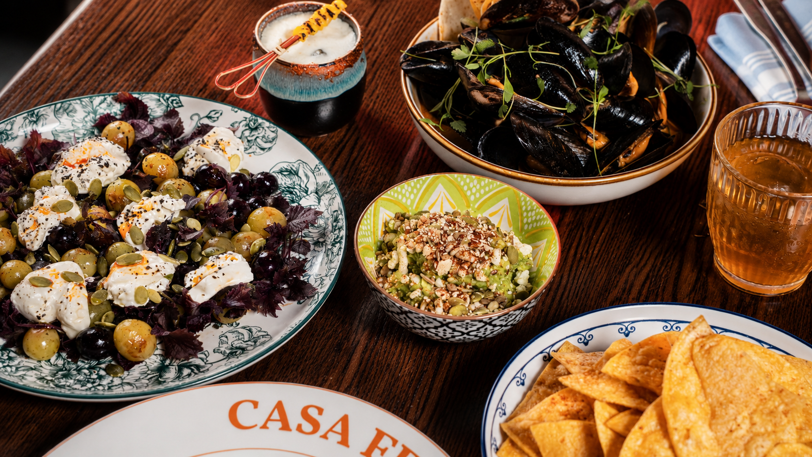 A colorful Casa Felix spread of modern Mexican plates, sauces, and cocktails.