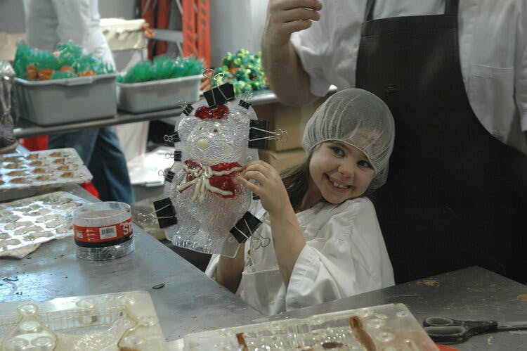 a person preparing food in a kitchen