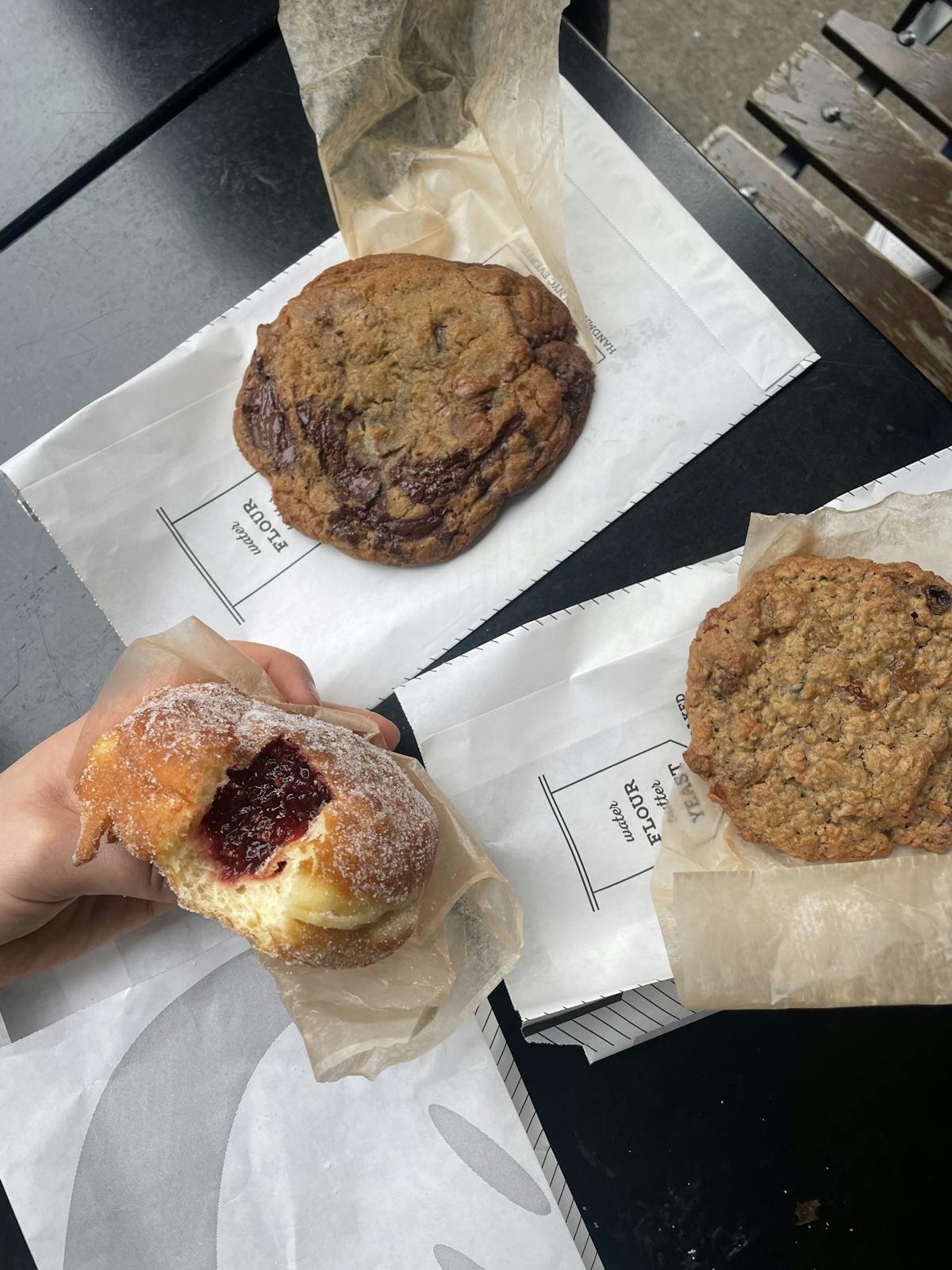 A jelly donut, a chocolate chip cookie, and an oatmeal cookie from Orwasher's Bakery in the Upper West Side.