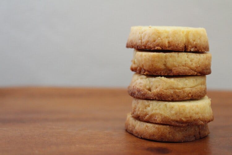 a piece of cake sitting on top of a wooden table