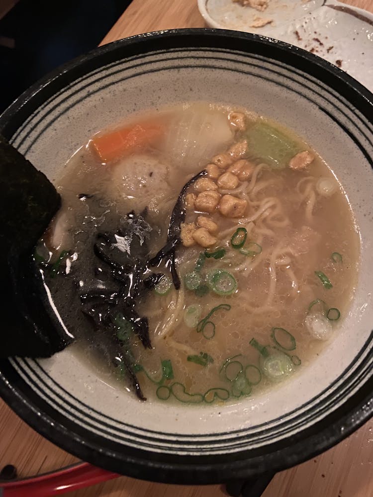 a bowl of soup and a spoon