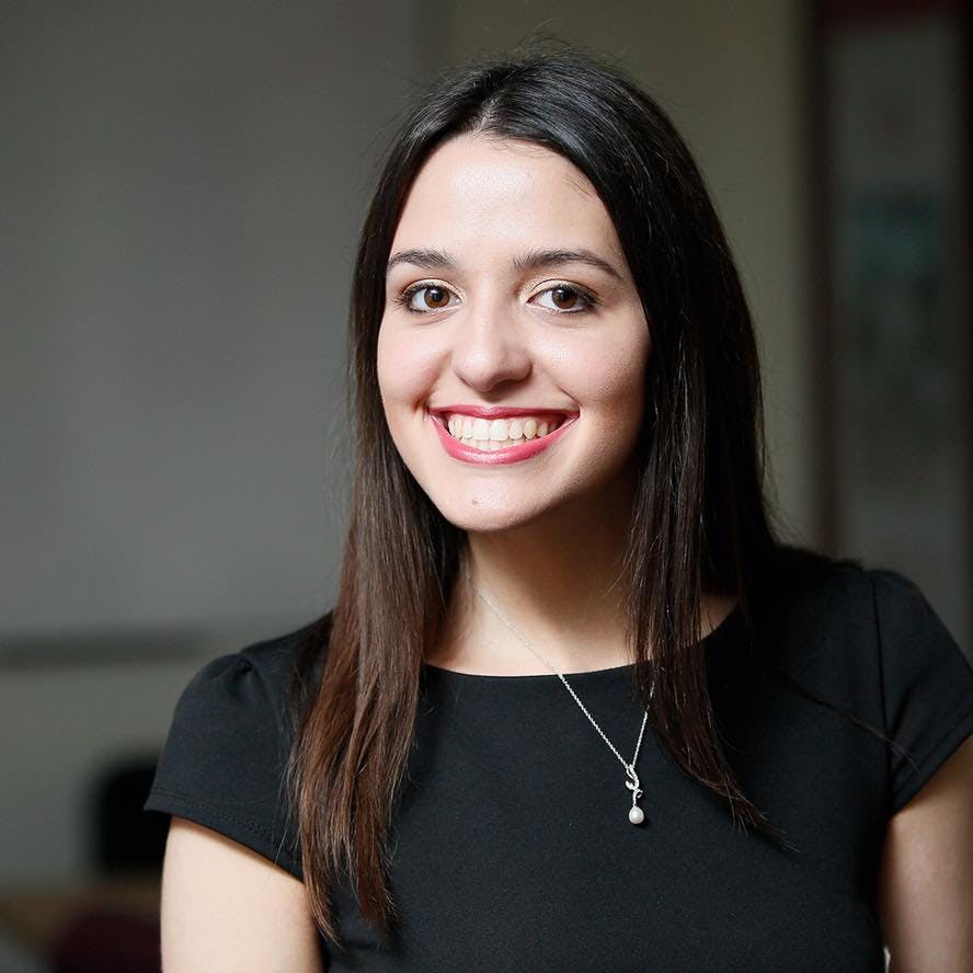 a woman smiling for the camera