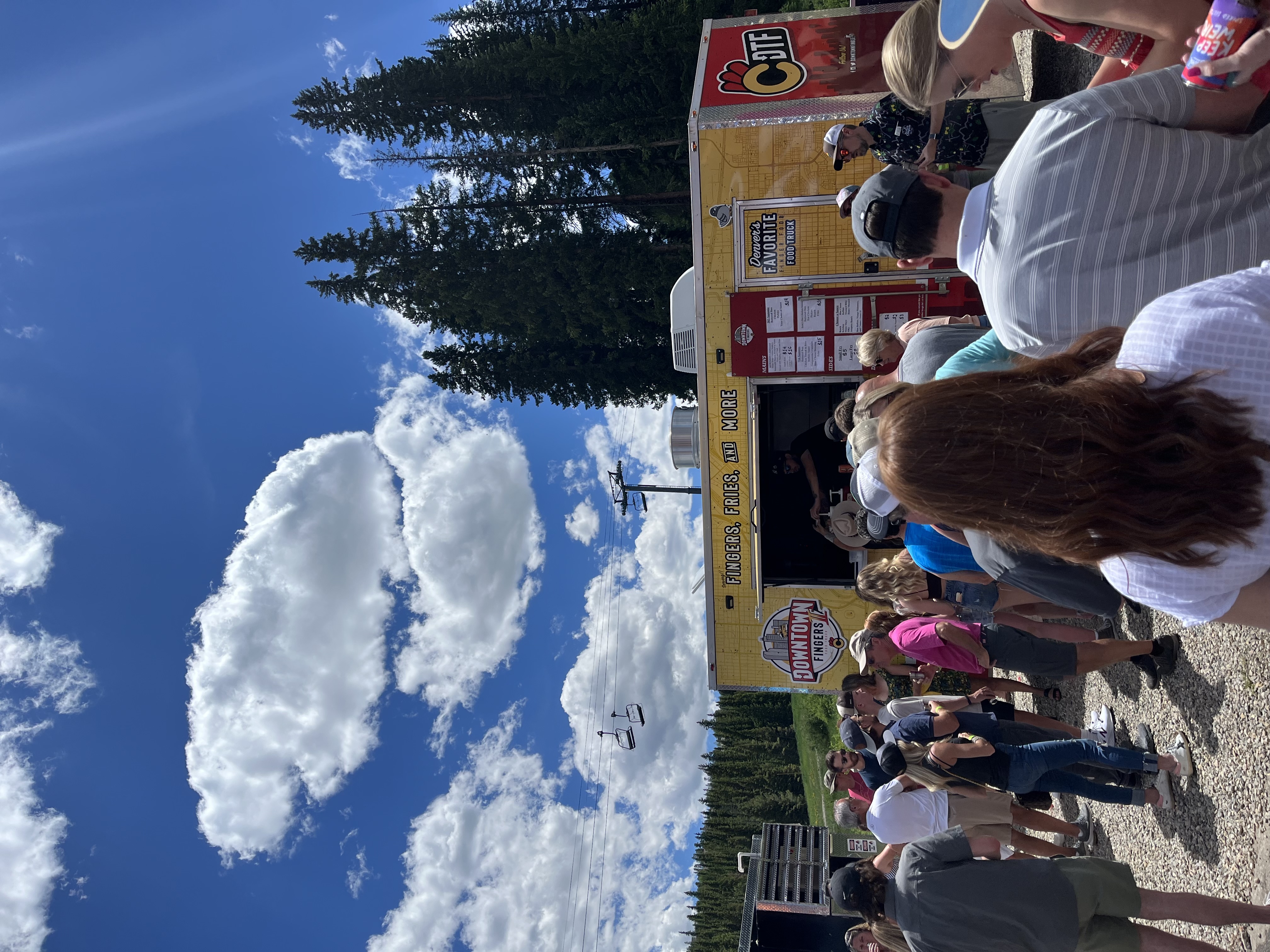 a group of people standing in front of a crowd