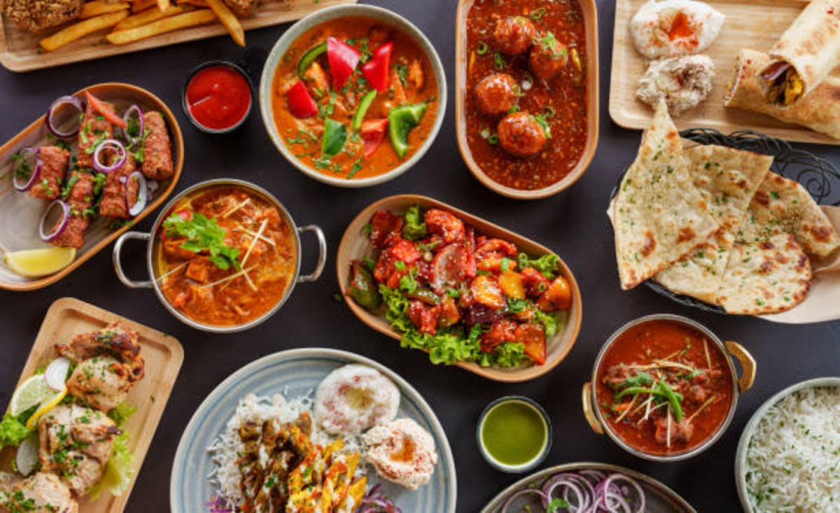 a bowl filled with different types of food on a table
