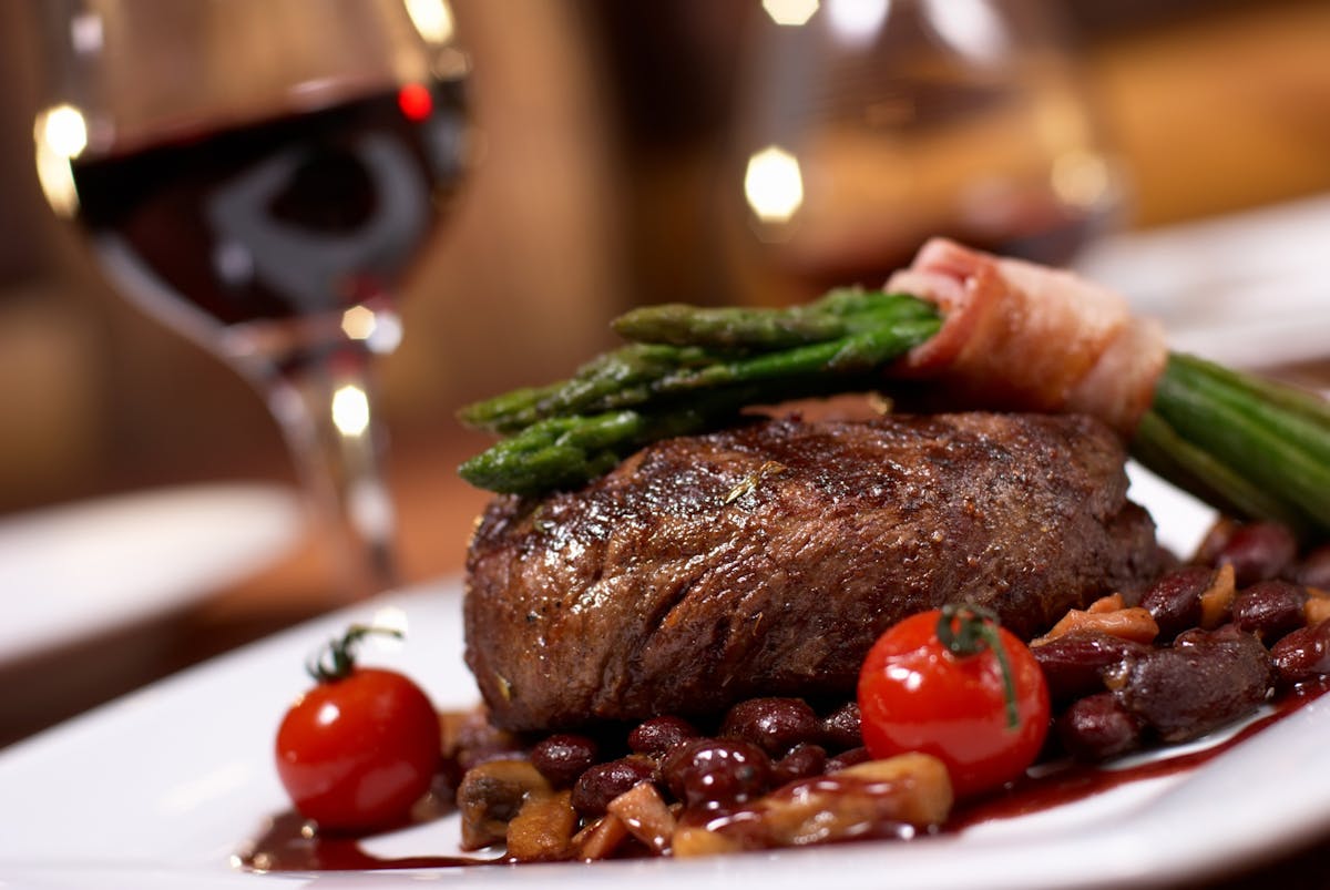 a close up of a plate of food on a table