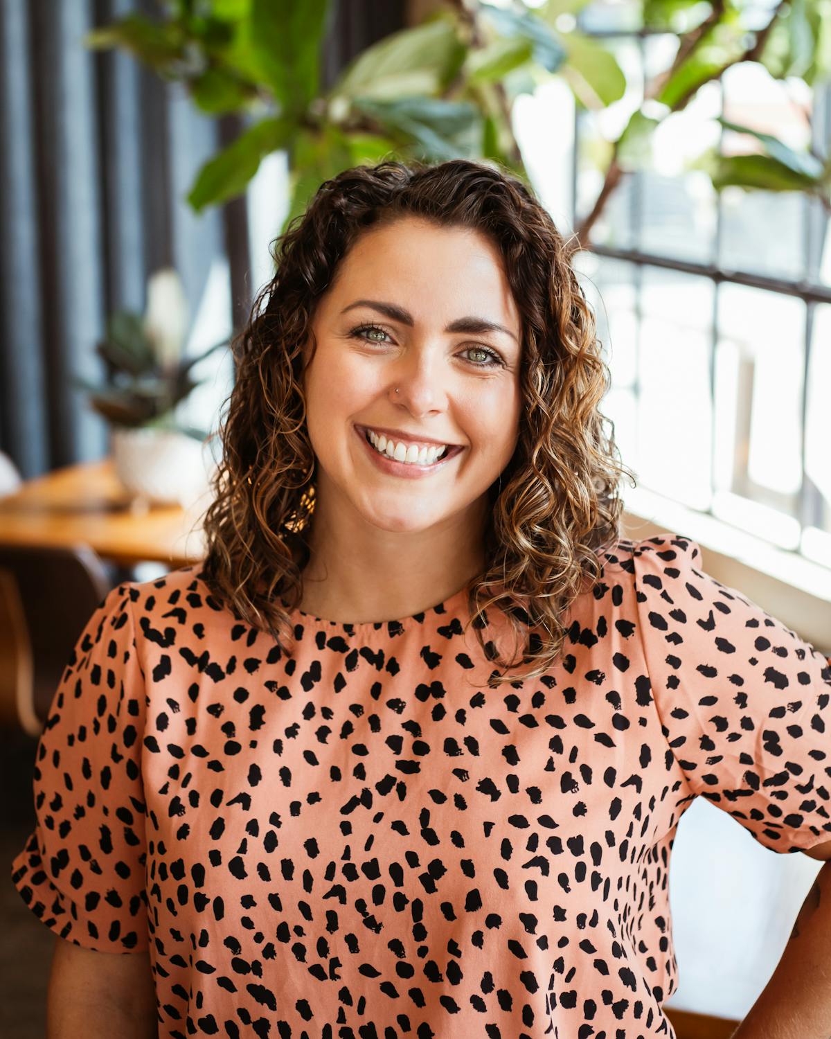 a woman smiling for the camera