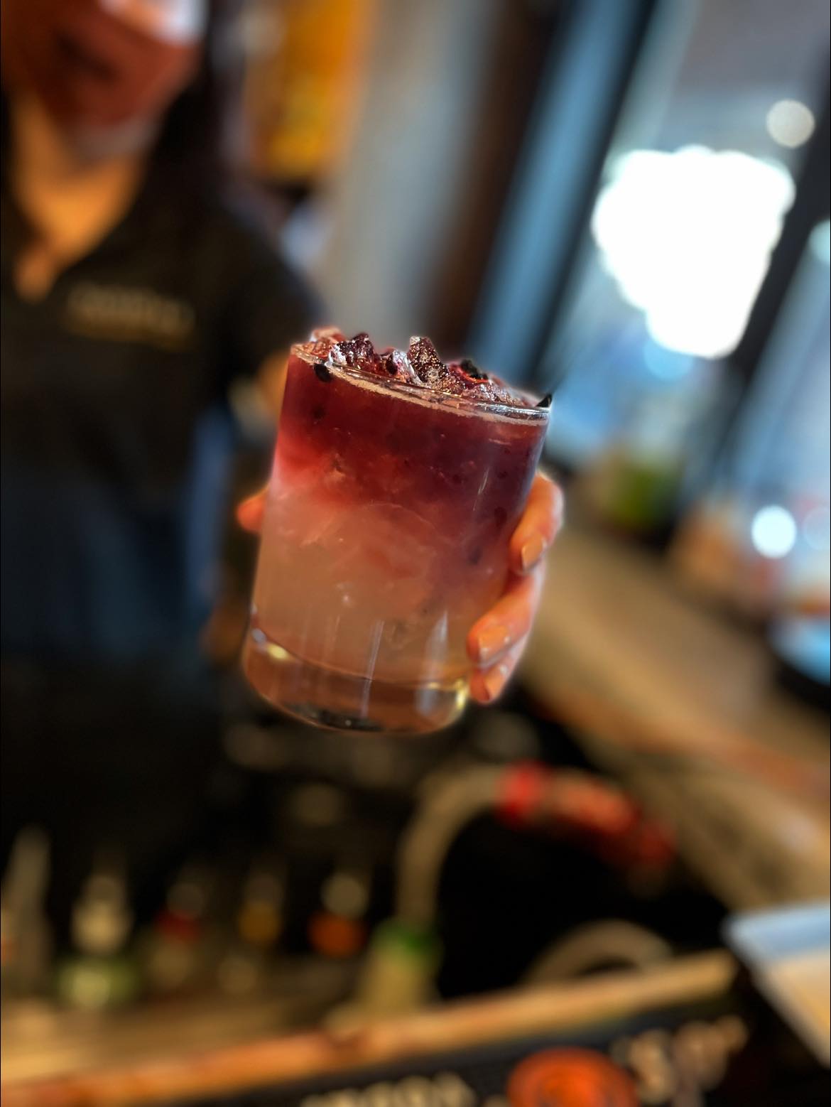 a close up of a glass cup on a table