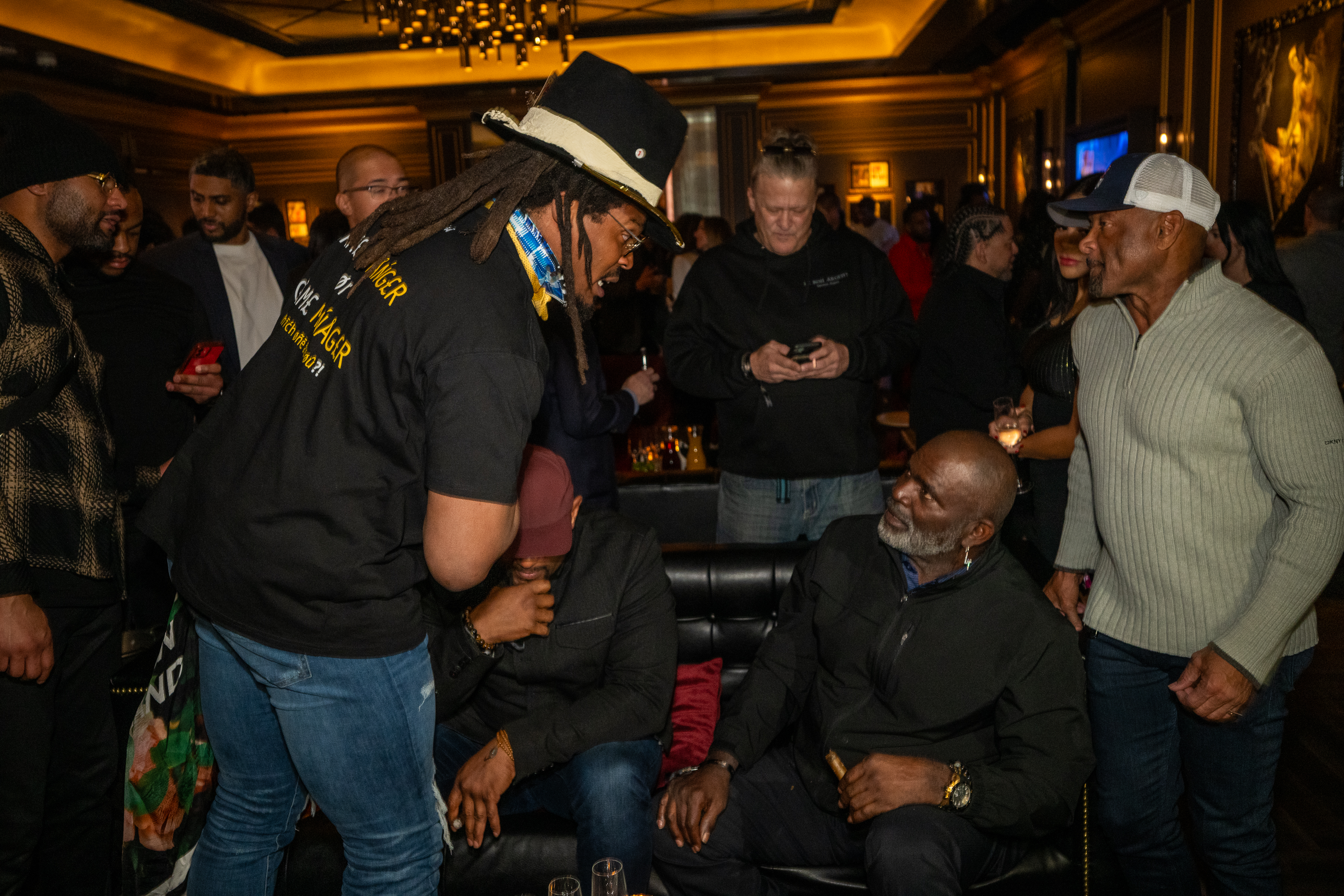 a group of people standing in a room