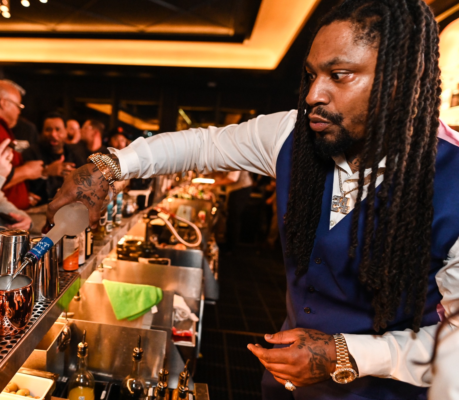 Marshawn Guest Bartending at Eight Lounge.