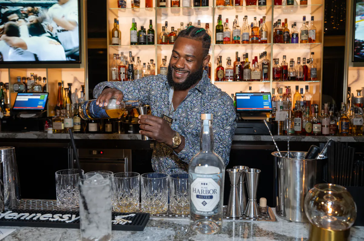 a man holding a glass of wine