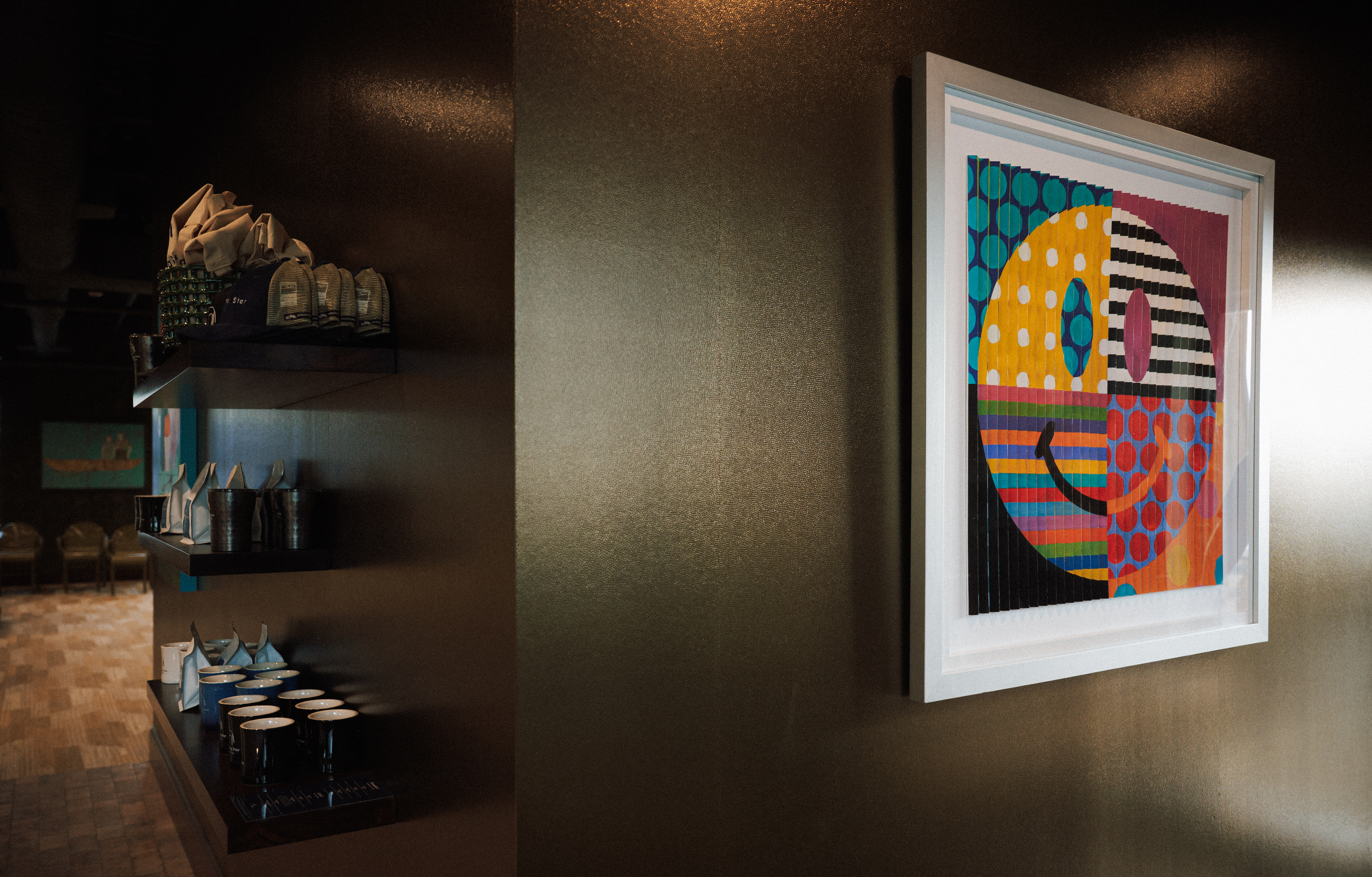 a framed art on a wall