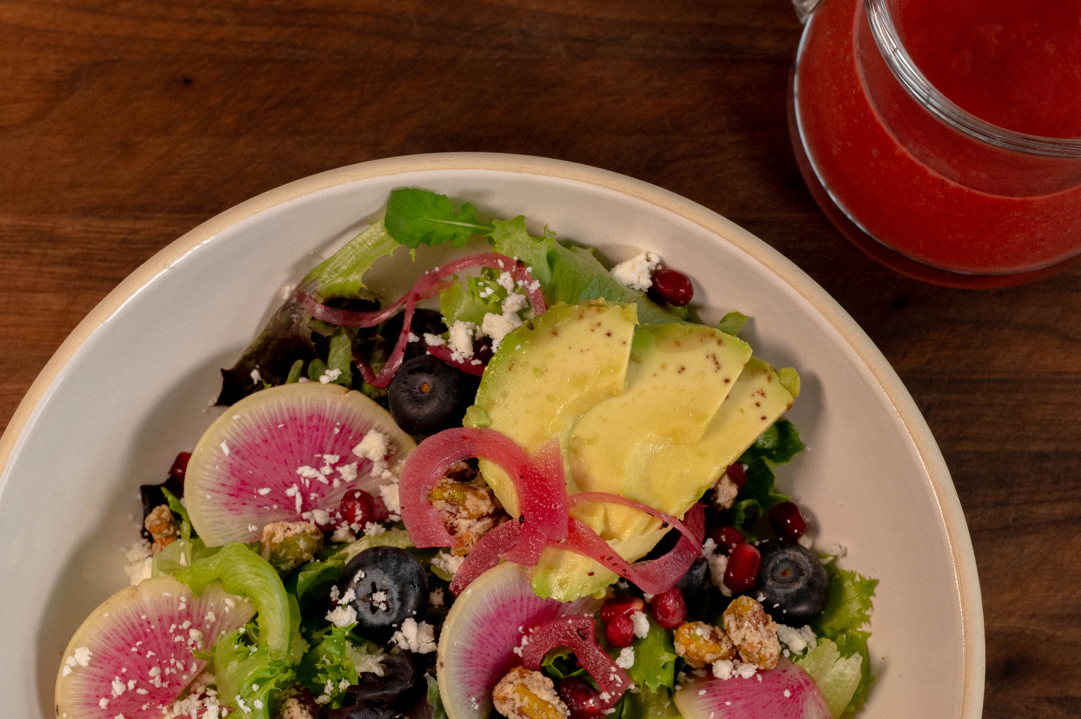 a bowl of fruit salad on a plate