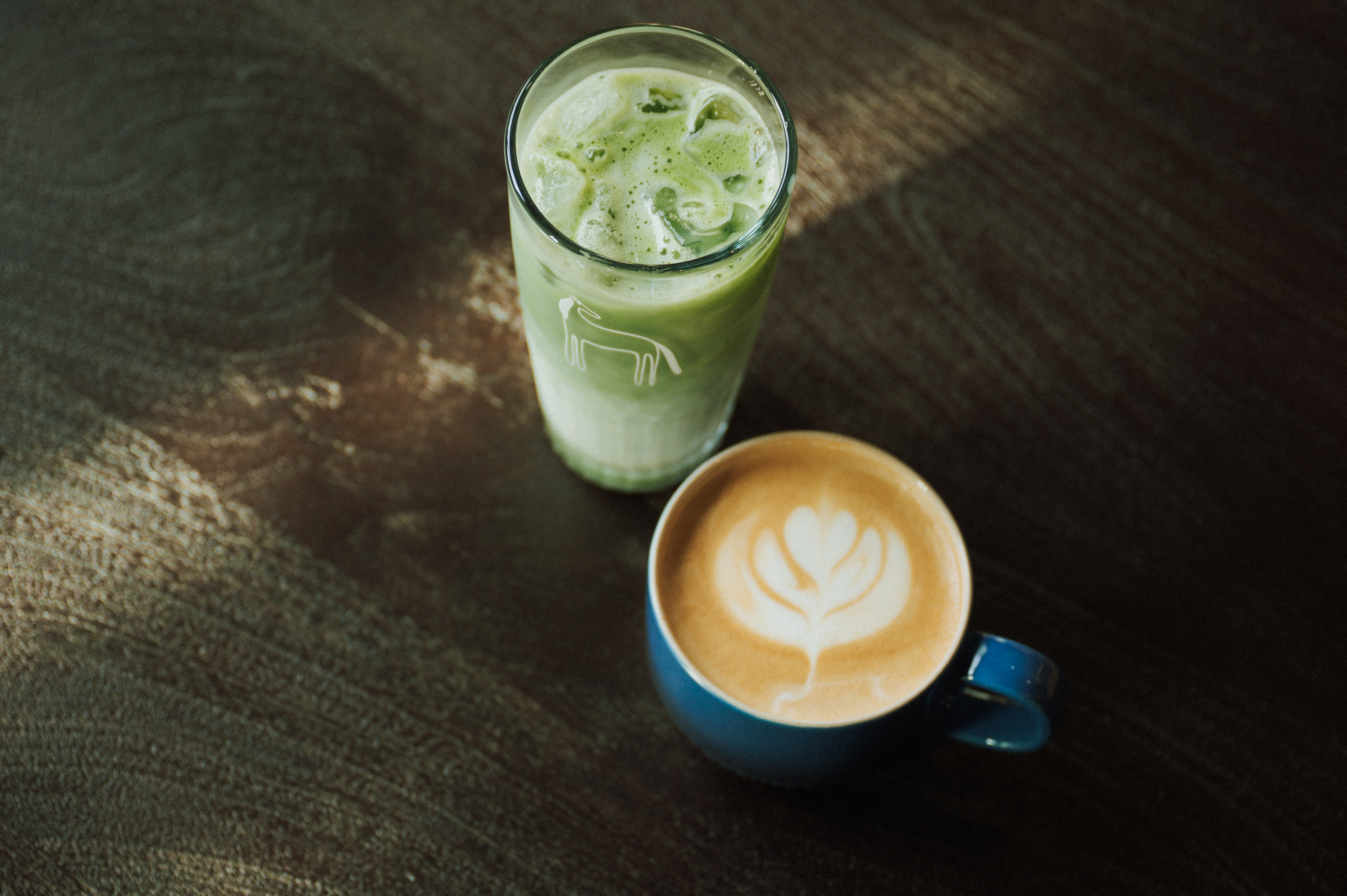 a cup of coffee and a glass of milk