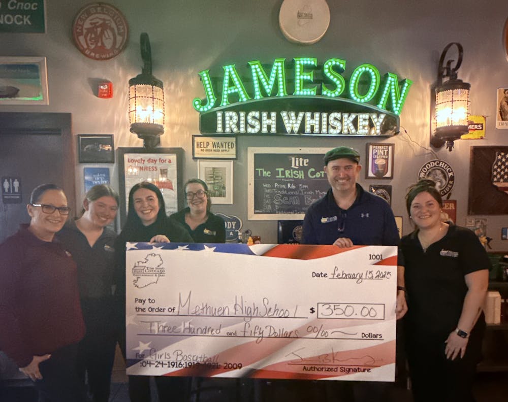 a group of people posing for the camera